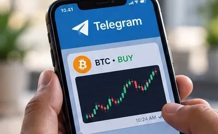 A phone showing a Bitcoin buy tip in a Telegram group